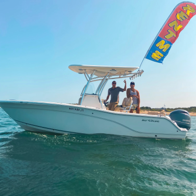 Private Boat Rental Adventure on Cape Cod Bay Private boat rental on Cape Cod Bay with guests enjoying a day on the water through Dennis Parasail & Jet Ski.